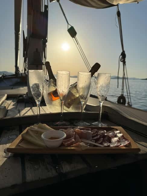 Porto San Paolo: Vintage Cruise Sunset Aperitif to Tavolara - Molara Island at Sunset: Aperitif, Snorkeling, and the View Shift