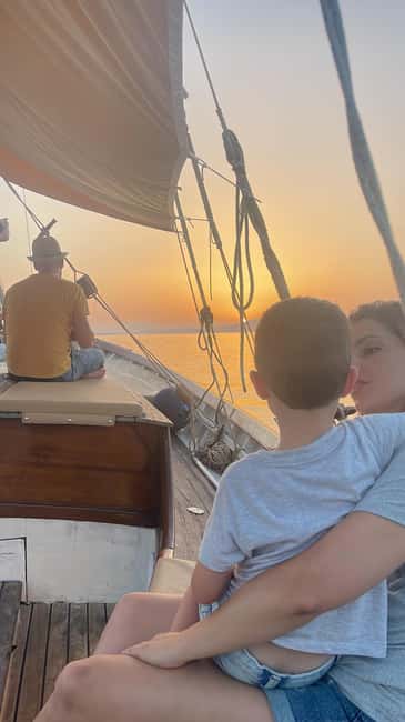 Porto San Paolo: Vintage Cruise Sunset Aperitif to Tavolara - Food, Drinks, and the Party Mood Without Losing Sight
