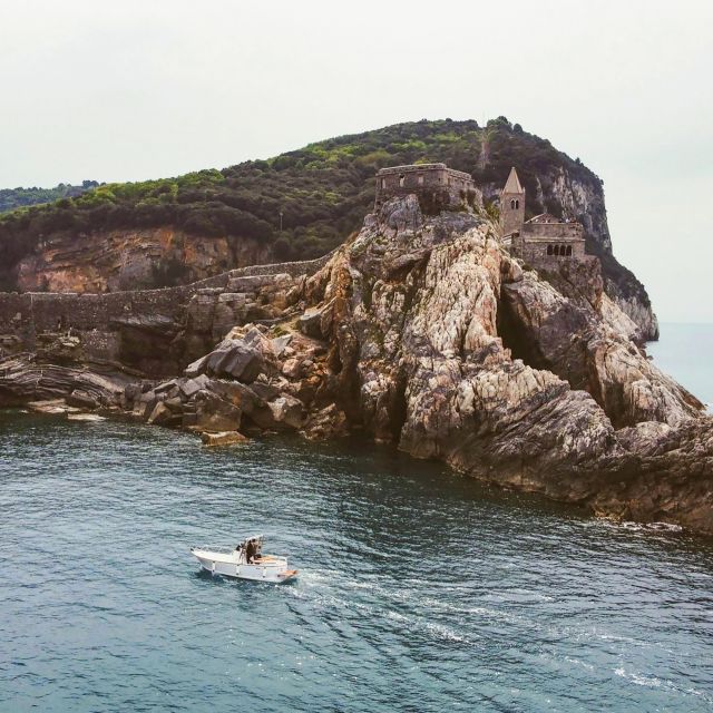 Portovenere: Isola Palmaria, Tino, and Tinetto Boat Tour - The boat ride from Portovenere: Torre Scola and the shoreline stories