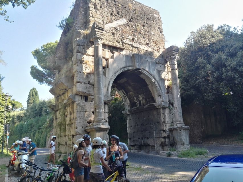 Rome: Appian Way Aqueducts Bike Tour (UPG Catacombs & Lunch) - Entering Porta San Sebastiano, Then Tuning Out the City