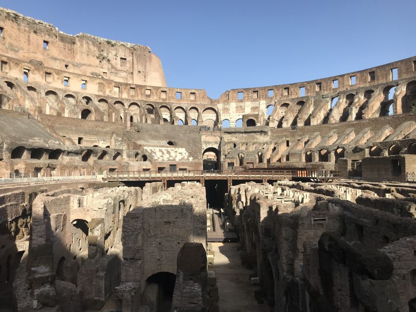 Rome: Arena of Colosseum, Roman Forum and Palatine Hill - Entering the Colosseum via the arena floor, plus tunnel-level context