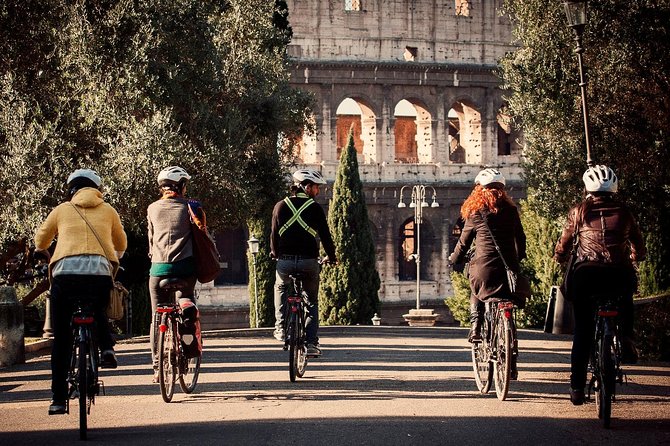 Rome City Small Group Bike Tour with quality Cannondale EBike - Riding Through the Forum Area: A Straight Shot Through Roman Time
