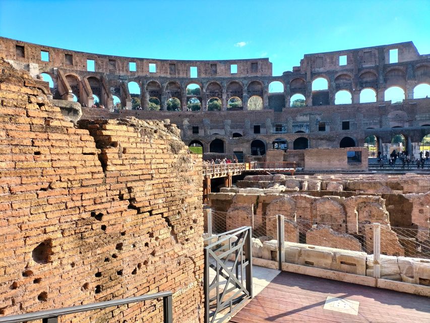 Rome: Colosseum and Ancient Rome Guided Walking Tour - Walking comfort, photo expectations, and smart questions to ask