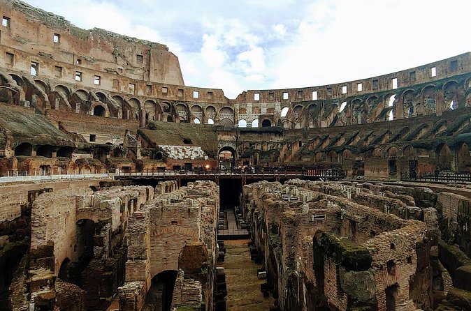 Rome: Colosseum Express Guided Tour - Entering the Colosseum: façade first, then two levels you can actually read