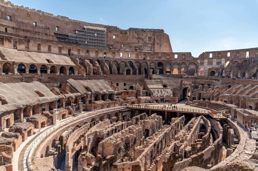 Rome: Colosseum Guided Tour - Inside the Colosseum: first level views, arena floor details, and gladiator stories