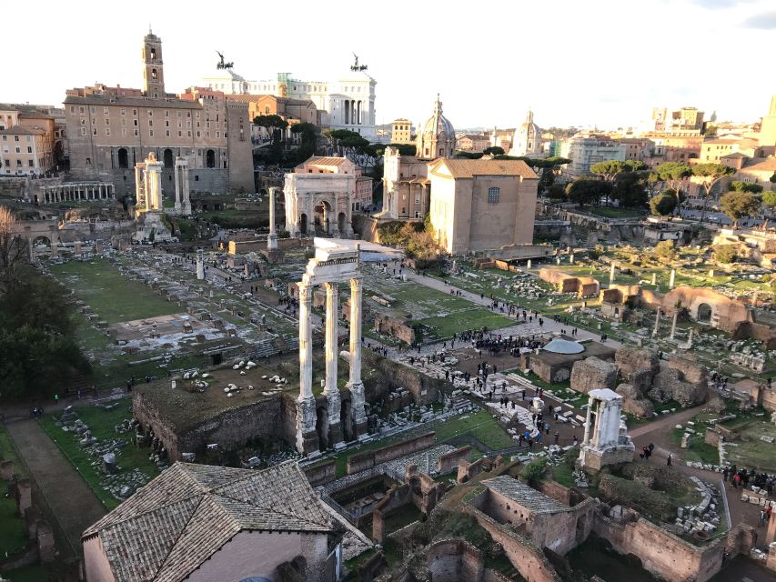 Rome: Colosseum, Roman Forum, and Palatine Hill Ancient Tour - Entering the Colosseum, first and second rings that make the arena click