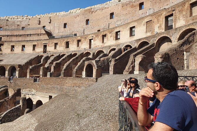 Rome: Colosseum, Roman Forum & Palatine Hill Experience - Entering the Colosseum, Tickets in Hand and Eyes Up
