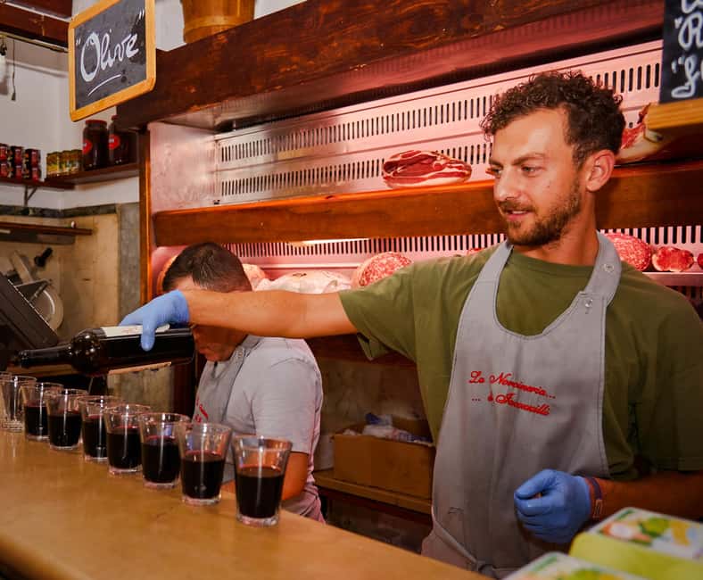 Rome: Guided Food Tour in Trastevere - Spirito di Vino: Wine Tasting and a Sit-Down Meal That Anchors the Tour