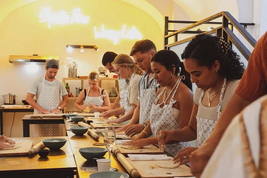 Rome: Traditional Pasta, Spritz & Tiramisu Cooking Class - First glass in hand: how the class starts in Rome