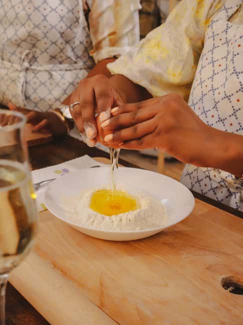 Rome: Traditional Pasta, Spritz & Tiramisu Cooking Class - Rolling fettuccine in a Rome kitchen: what you actually do