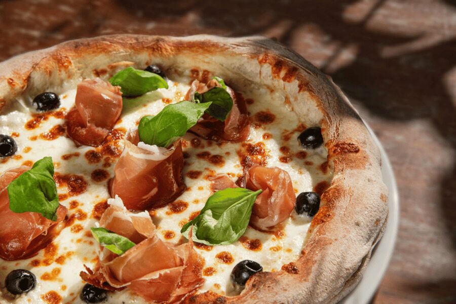 Rome: Traditional Pizza Cooking Class near Piazza Navona - Osteria Pasquino meal moments: drinks, bruschetta, and eating your own work