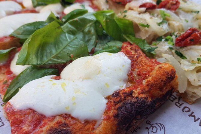 Rome: Trastevere Food tour with Free-Flowing Fine Wine - Pizza and craft beer: classic Roman dinner energy