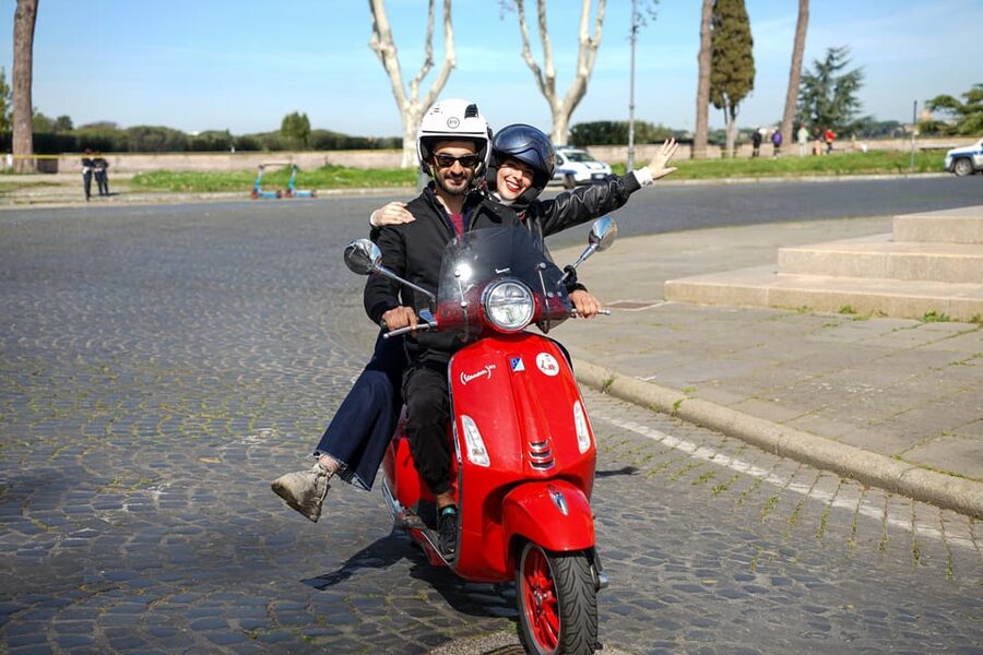 Rome Vespa Tour with Professional Photoshoot - Colosseum photo stop, where the views meet the camera work