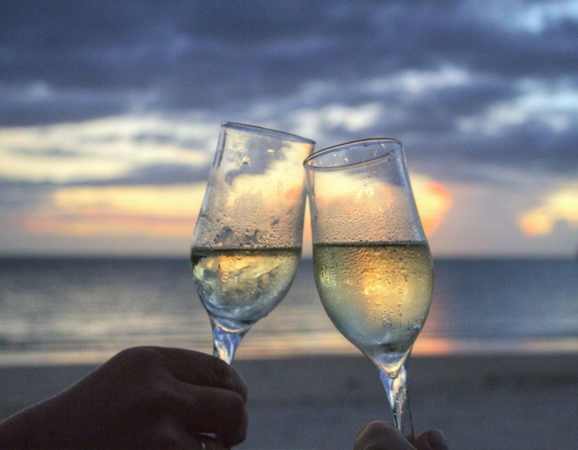 Sirmione: Sunset Boat Cruise with Local Wine - What the 45-minute route covers: harbor views, Grotte di Catullo, and Scaligero Castle