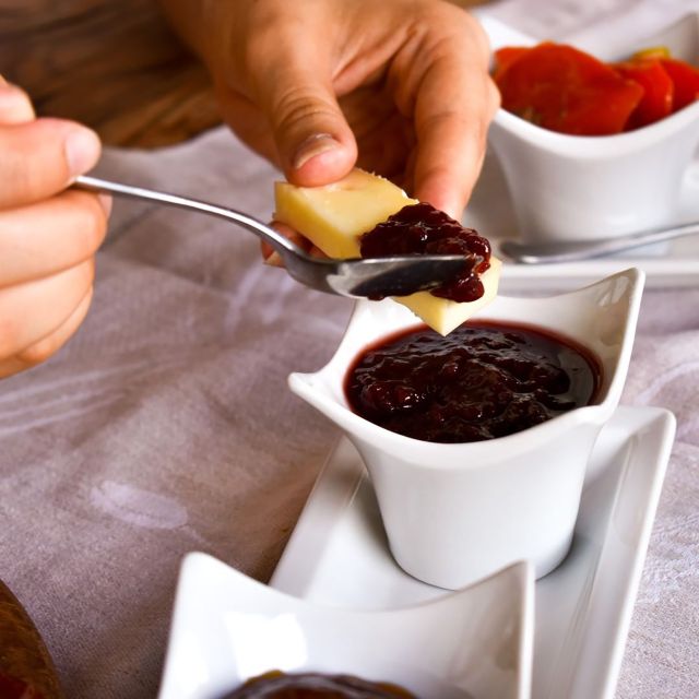 Sirmione: Vineyard Tour with Lugana Wines and Local Tastings - Local tastings done right: cheeses, jam, olive oil, and Brescia salami