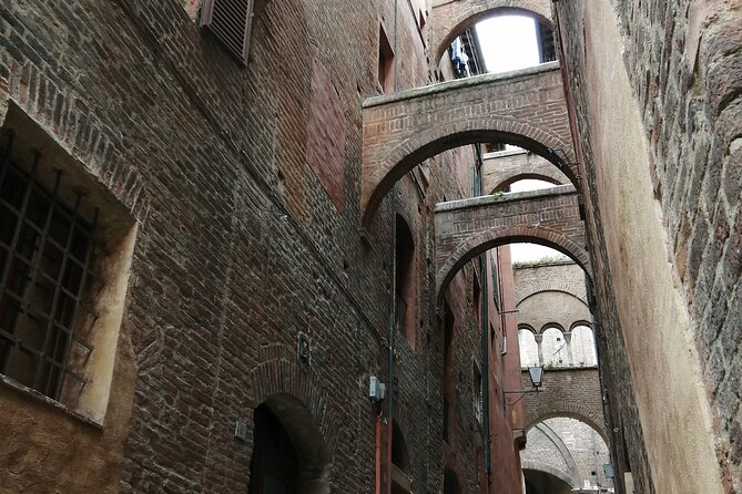 Skip the Line: Siena Duomo and City Walking Tour - Piazza Salimbeni: Gothic power, plus a bank fact that sticks