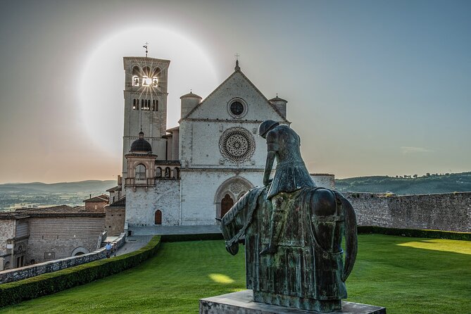 Small Group Tour of Assisi and St. Francis Basilica - St. Clare’s Basilica: pink stone, centuries of frescoes, and a famous crucifix