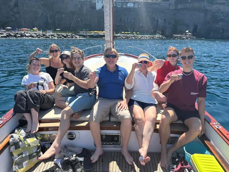 Sorrento: Boat Coastal Cruise with Swim and Limoncello - Mount Vesuvius views: the coast’s secret background feature