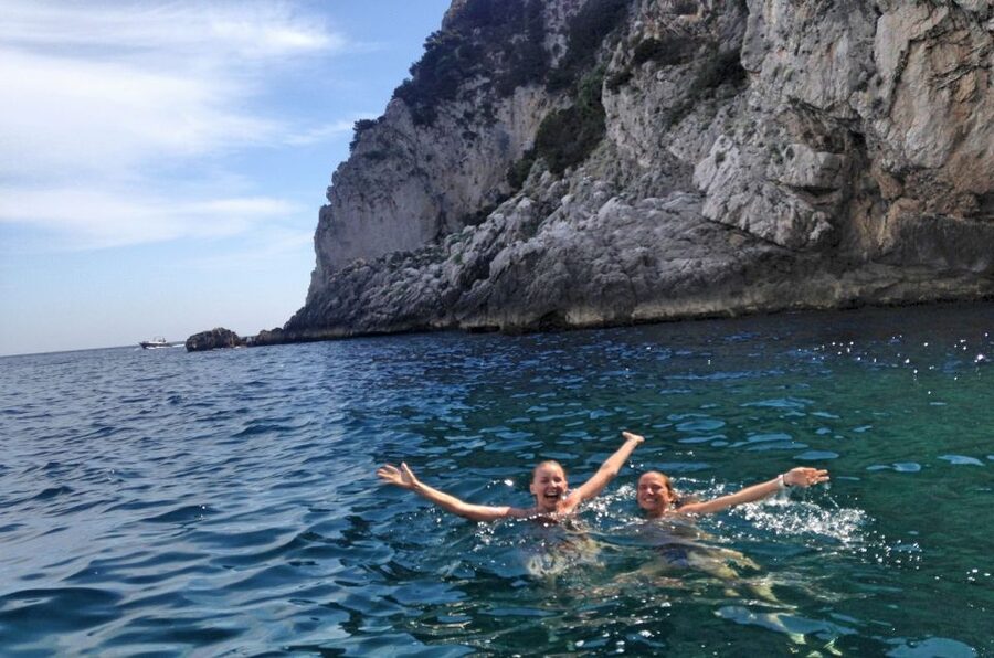 Sorrento: Capri and Blue Grotto Boat Cruise with Drinks - Capri by boat: Faraglioni, caves, and the famous views up close
