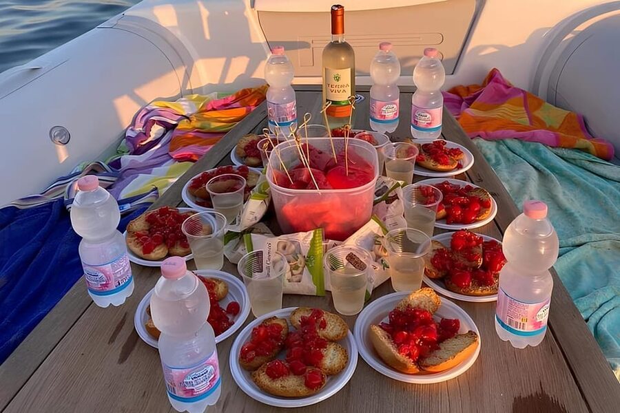 Sunset at the Island of S.Andrea Gallipoli - With aperitif - The captain factor, and why the group mood matters here