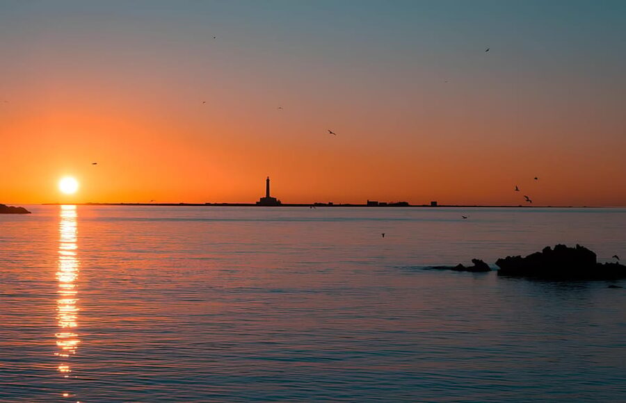 Sunset at the Island of S.Andrea Gallipoli - With aperitif - The 3-hour flow, from meeting point to the fiery sun