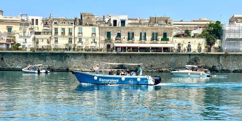 Syracuse: Ortigia Island and Sea Caves Boat Tour with Drinks - Ortigia’s coastline views: Maniace Castle and the Alfeo seafront