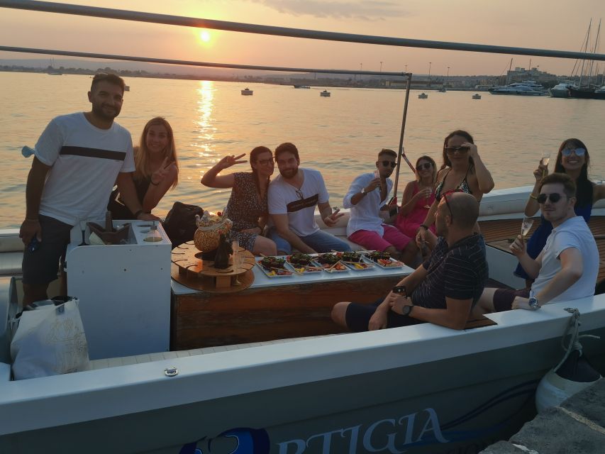 Syracuse: Ortigia Sunset Cruise with Aperitif - Captains and onboard music: why the atmosphere feels so easy