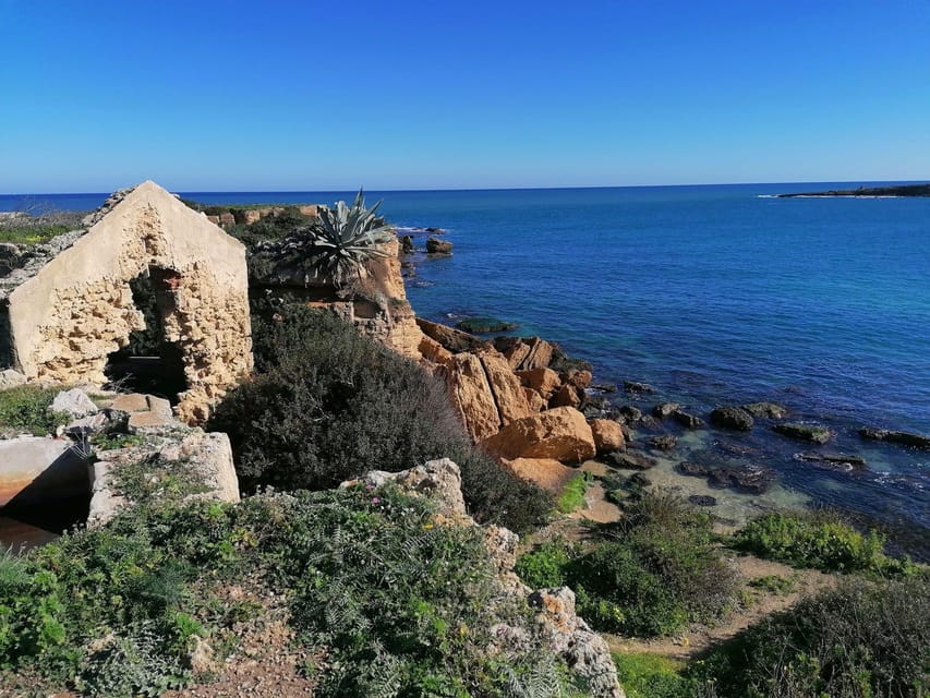 Syracuse: Pillirina, Ortigia, Sea Caves and snorkeling - Pillirina Grotto swim stop: where the water and limestone meet