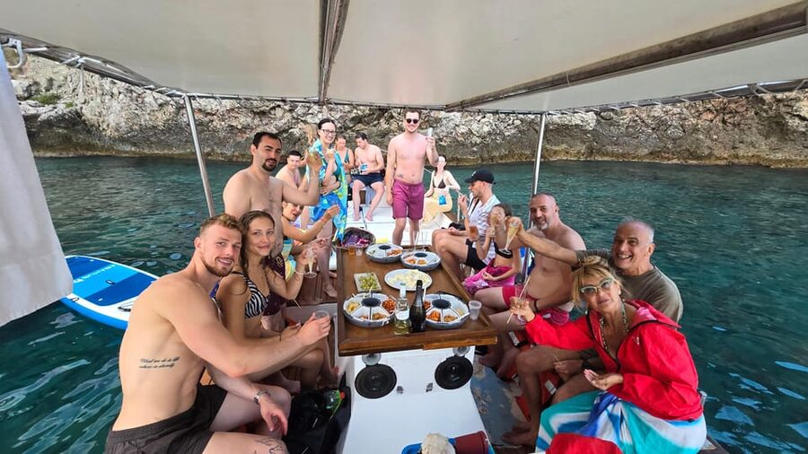Taormina: Coastline Boat Tour with Aperitif and Snorkeling - Isola Bella stop: aperitif, snorkeling, and the best time to get in the water