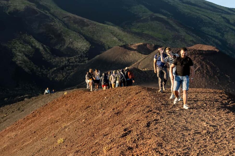 Taormina: Mount Etna Sunset Tour with Cave Visit and Tasting - From Taormina to Etna: the van ride that actually helps