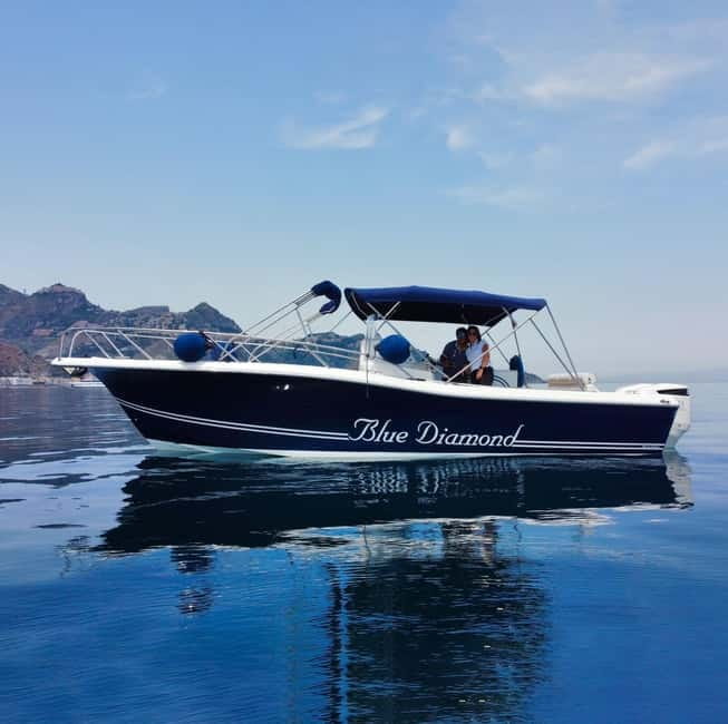 Taormina: Sunset Boat Tour with Dolphin Watching & Aperitif - Cape Taormina and the bays: the view changes every few minutes