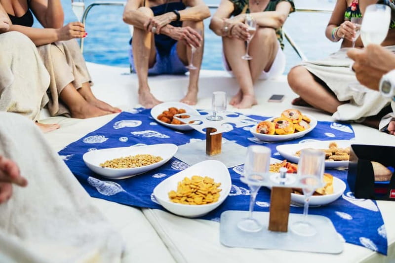 Taormina: Sunset Boat Tour with Dolphin Watching & Aperitif - Aperitif moment: snacks, fruit, and drinks that keep the mood right