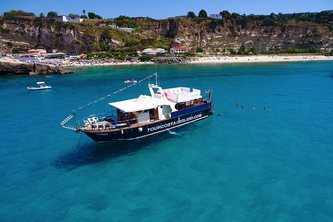 Tour of the Costa degli Dei by boat, 3 hours with aperitif included - Grotticelle Beach: sandy shallows, fish, and that crystal-water look