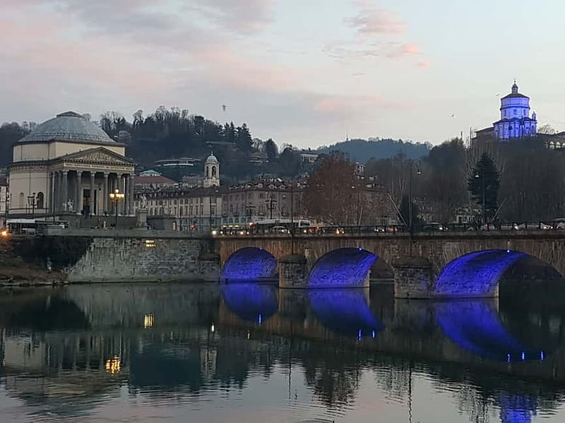 Turin: City Highlights Guided Bike Tour - The downtown loop: royal Turin, Palazzo Carignano, and Porte Palatine