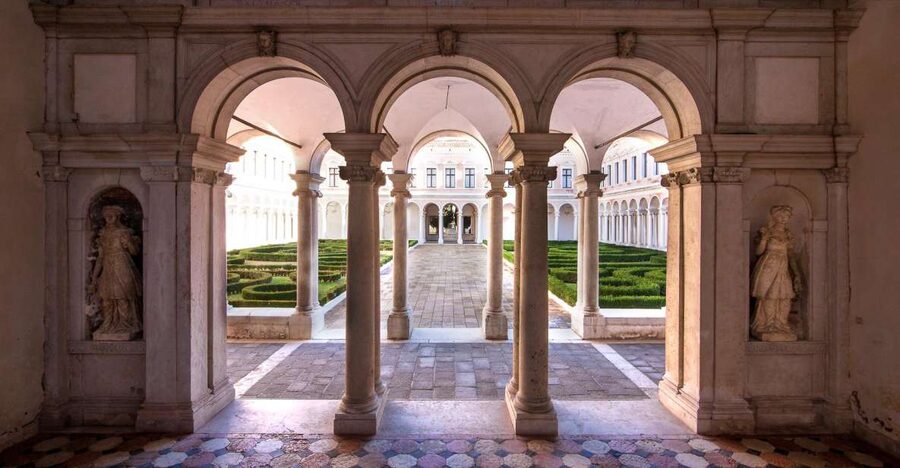 Venice: Explore San Giorgio Island with Ticket & Audio Guide - Entering the Giorgio Cini Foundation complex, one courtyard at a time
