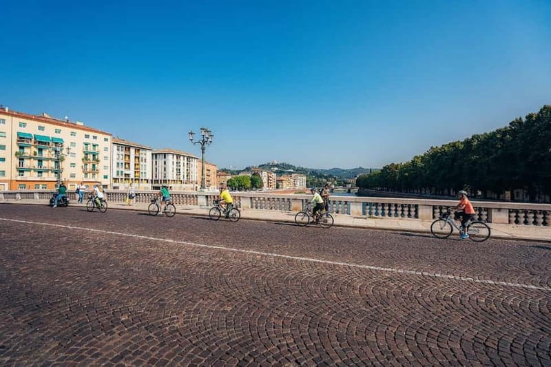 Verona: Classic and Hidden Gems Bike Tour - Meeting at Ristori Theater, Bikes, Helmets, and Group Vibe