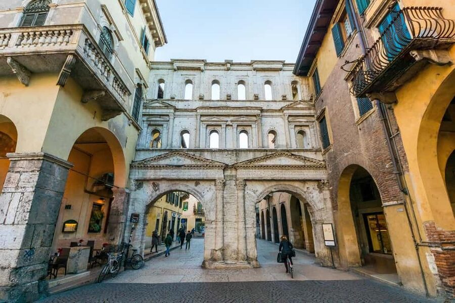 Verona: Small Group Guided Walking Tour with Arena Tickets - Piazza delle Erbe: where Verona feeds itself and tells stories